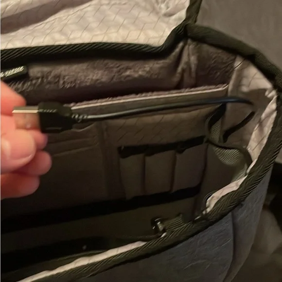 Waterproof backpack with portable charger port